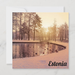 Sunset over park with small frosty lake postcard