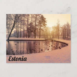 Sunset over park with small frosty lake postcard