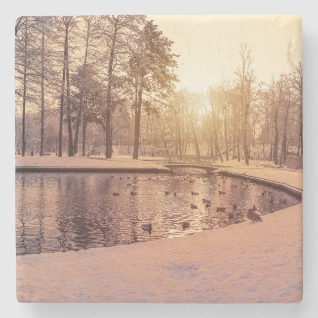 Sunset over park with small frosty lake stone coaster (Front)