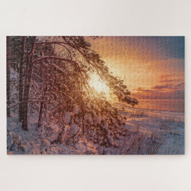 Sunset over sea and snowy pine tree jigsaw puzzle (Horizontal)
