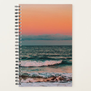 sunset over sea planner