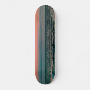 sunset over sea skateboard