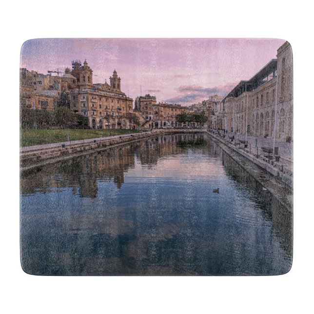 Sunset over small canal in Cospicua, Malta Cutting Board (Front)