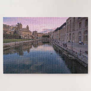 Sunset over small canal in Cospicua, Malta Jigsaw Puzzle