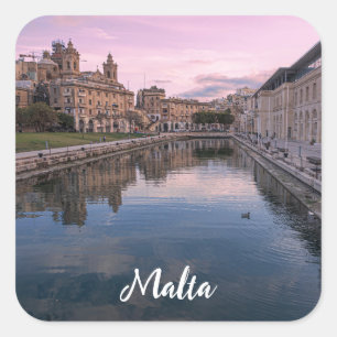 Sunset over small canal in Cospicua, Malta Square Sticker