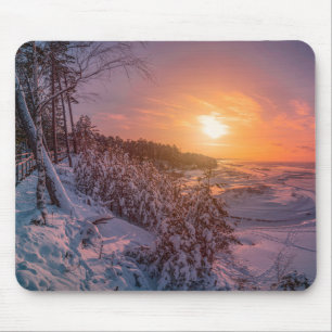Sunset over snow sea coast mouse mat