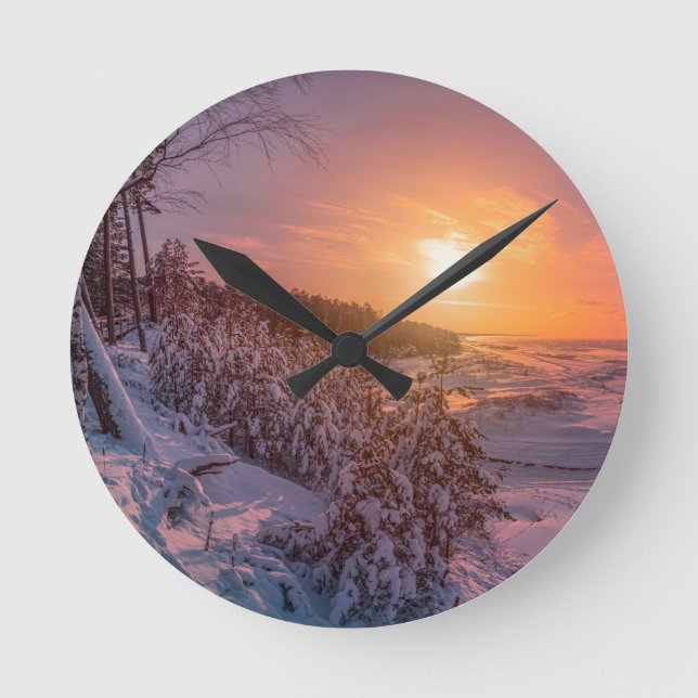 Sunset over snow sea coast round clock (Front)