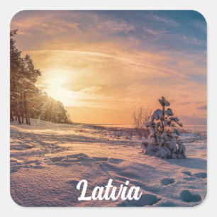 Sunset over snowy winter sea coast square sticker