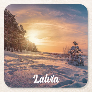 Sunset over snowy winter seacoast square paper coaster