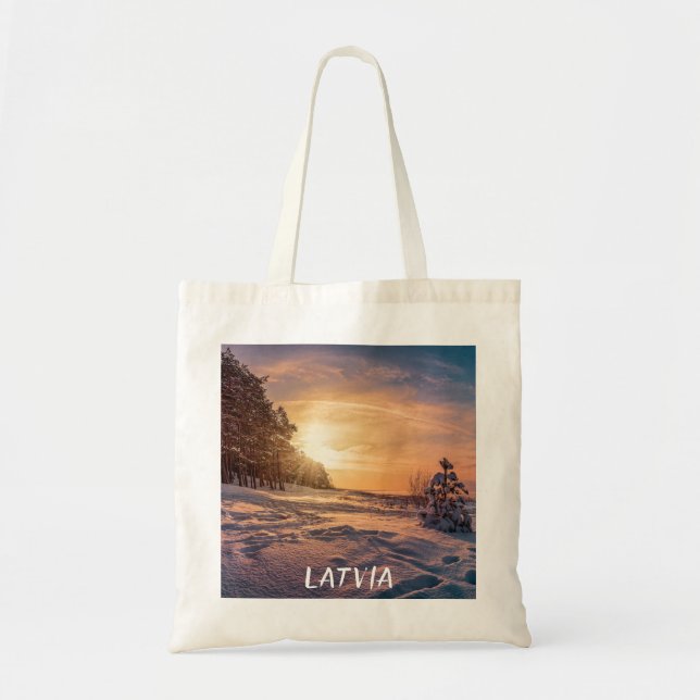 Sunset over snowy winter seacoast tote bag (Front)