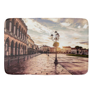 Sunset over square in Padova in Italy Bath Mat