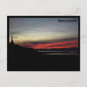 Sunset over the sea in Aberystwyth postcard