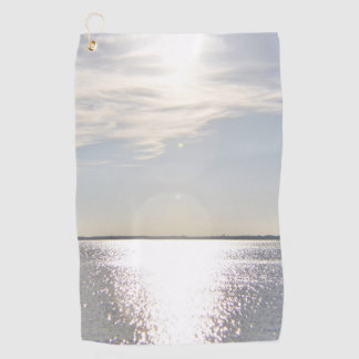 Sunset over water Golf Towel