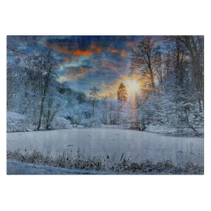 Sunset Over Winter Forest Lake Cutting Board