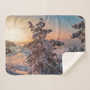 Sunset over winter snowy sea coast sherpa blanket
