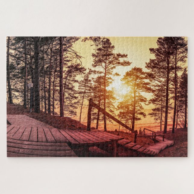 Sunset over wooden path in pine forest jigsaw puzzle (Horizontal)