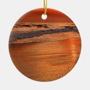Sunset reflections off clouds and ocean shore ceramic tree decoration