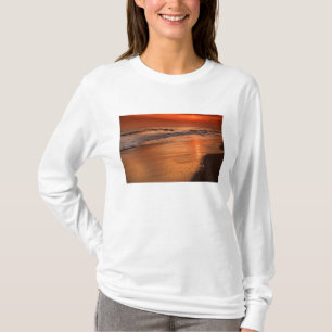 Sunset reflections off clouds and ocean shore T-Shirt