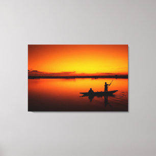 Sunset, Rowing Boat in The Sea Canvas Print