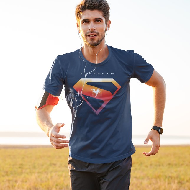 Sunset Soar Superman Shield T-Shirt (Person wearing t-shirt)