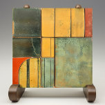 Sunset Spectrum Abstract Ceramic Tile<br><div class="desc">Immerse yourself in the warmth of the setting sun with this exquisite ceramic tile, a symphony of hues that captures the essence of a sunset spectrum. Each square is a canvas, displaying an array of colours ranging from the deep charred ember black, through a gradient of sun-kissed oranges to the...</div>