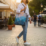 Sunset tote. Geometric pattern tote bag<br><div class="desc">Bring vibrant energy to your everyday style with this sunset inspired tote bag, showcasing a bold geometric triangle pattern in rich shades of blue, orange, and gold. The striking colour palette combined with delicate gold bordered lines creates a modern and elegant design. This versatile accessory is perfect for shopping trips,...</div>