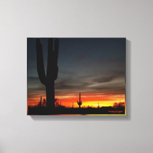 Sunset with giant saguaro cactus in Arizona desert Canvas Print