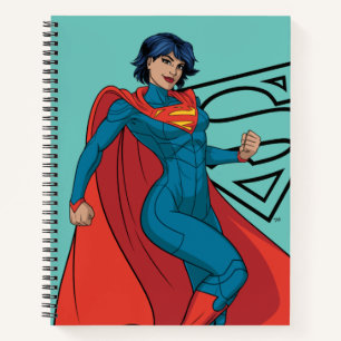 Supergirl Hovering in Blue Suit Notebook