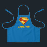 Superman Golden S Shield Brilliance Apron<br><div class="desc">Shine bright with the legendary symbol of hope! This stunning design features the iconic Superman “S” shield rendered in radiant gold and deep crimson, glowing with heroic intensity against a bold blue background. The sleek metallic finish and rich colour gradients give this emblem a powerful, modern edge—perfect for fans who...</div>