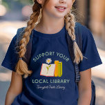 Support Your Local Library Custom T-Shirt<br><div class="desc">Show your love for reading and community with this custom “Support Your Local Library” t-shirt featuring a cute hand-drawn books and flower graphic. Personalise it with your library name, town, or city for a thoughtful and meaningful design. A perfect gift for book lovers, teachers, librarians, or anyone passionate about supporting...</div>