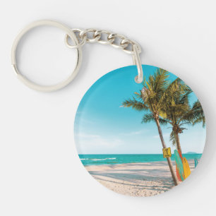 Surf boards on beach throw pillow key ring