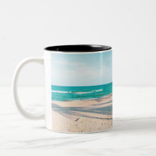 Surf boards on beach throw pillow Two-Tone coffee mug