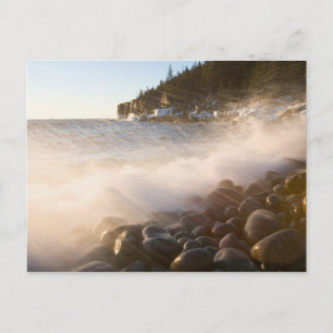 Surf washes over the cobblestones in Monument Postcard