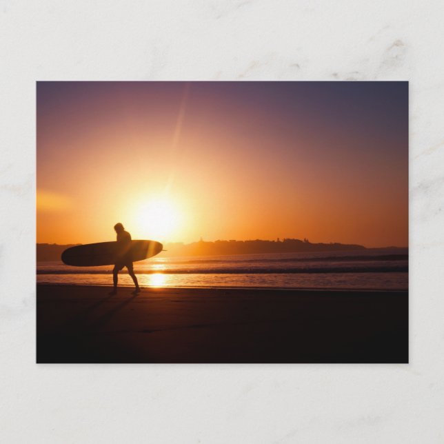 Surfer Carrying Surfboard on Beach at Sunset Postcard (Front)