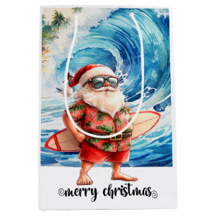 Surfer Santa with his surf board at the beach Medium Gift Bag