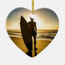 Surfer silhouette during sunrise