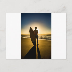 Surfer silhouette during sunrise postcard