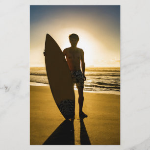 Surfer silhouette during sunrise stationery