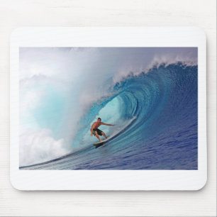 Surfer surfing a huge wave. mouse mat