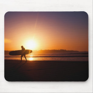 Surfer with Surfboard on Beach at Sunset Mouse Mat