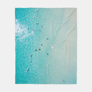Surfers aerial view, clear ocean. fleece blanket