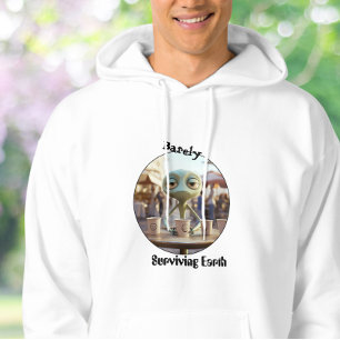 Surviving earth alien coffee drinker hoodie