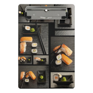 Sushi collection on black background mini clipboard