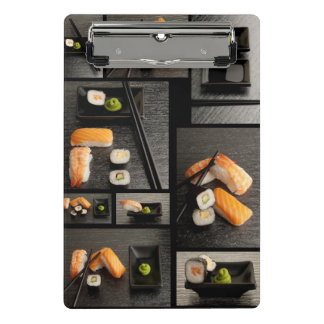Sushi collection on black background mini clipboard