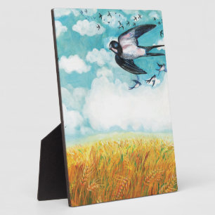 Swallows flying over a wheat field plaque
