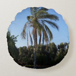Swaying Palm Tree Under a Clear Sky Round Cushion