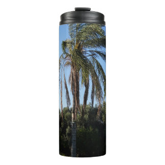 Swaying Palm Tree Under a Clear Sky Thermal Tumbler