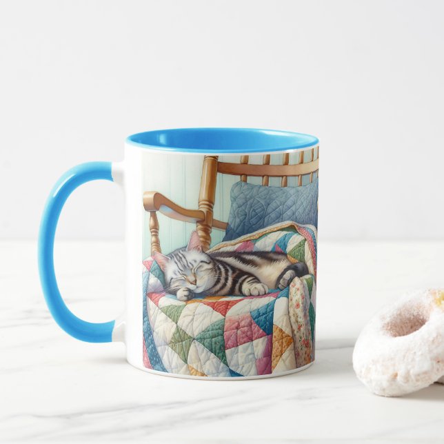 Sweet Grey Cat Sleeping on a Quilt Mug (With Donut)