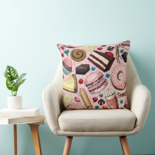 Sweet treats on pink cushion
