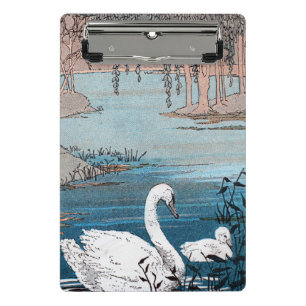 Swimming Mother White Swan in Lake With Baby Mini Clipboard